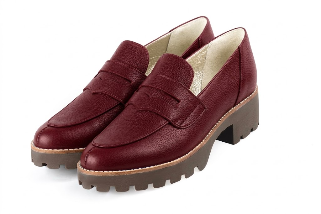 Step out in modern chunky loafers featuring durable lug soles, offering lightweight support, extra grip and bold everyday style, in burgundy leather with round toe and chunky rubber lug sole
